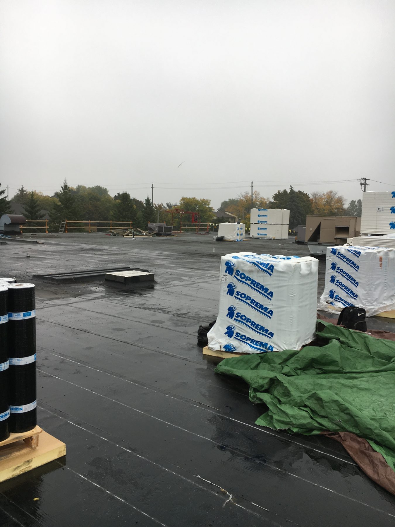 Commercial low-slope roof installation at 310 Limeridge Road West